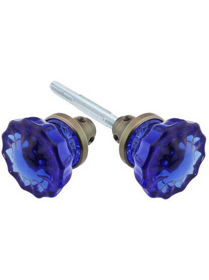 Pair of Cobalt Blue Fluted Crystal Glass Door Knobs in Antique Brass.